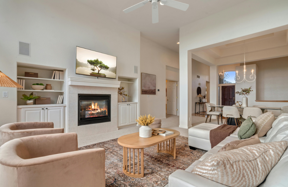 A lounge room with a gas fireplace as the focus.