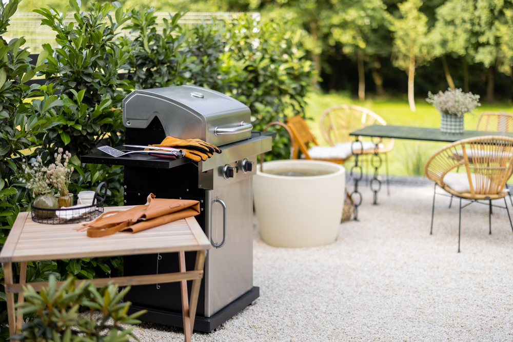 A BBQ in a warm outdoor setting. 