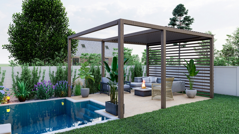 A luxurious backyard patio area by a pool displaying outdoor fire pit safety in Australia with safe distance from structures. 